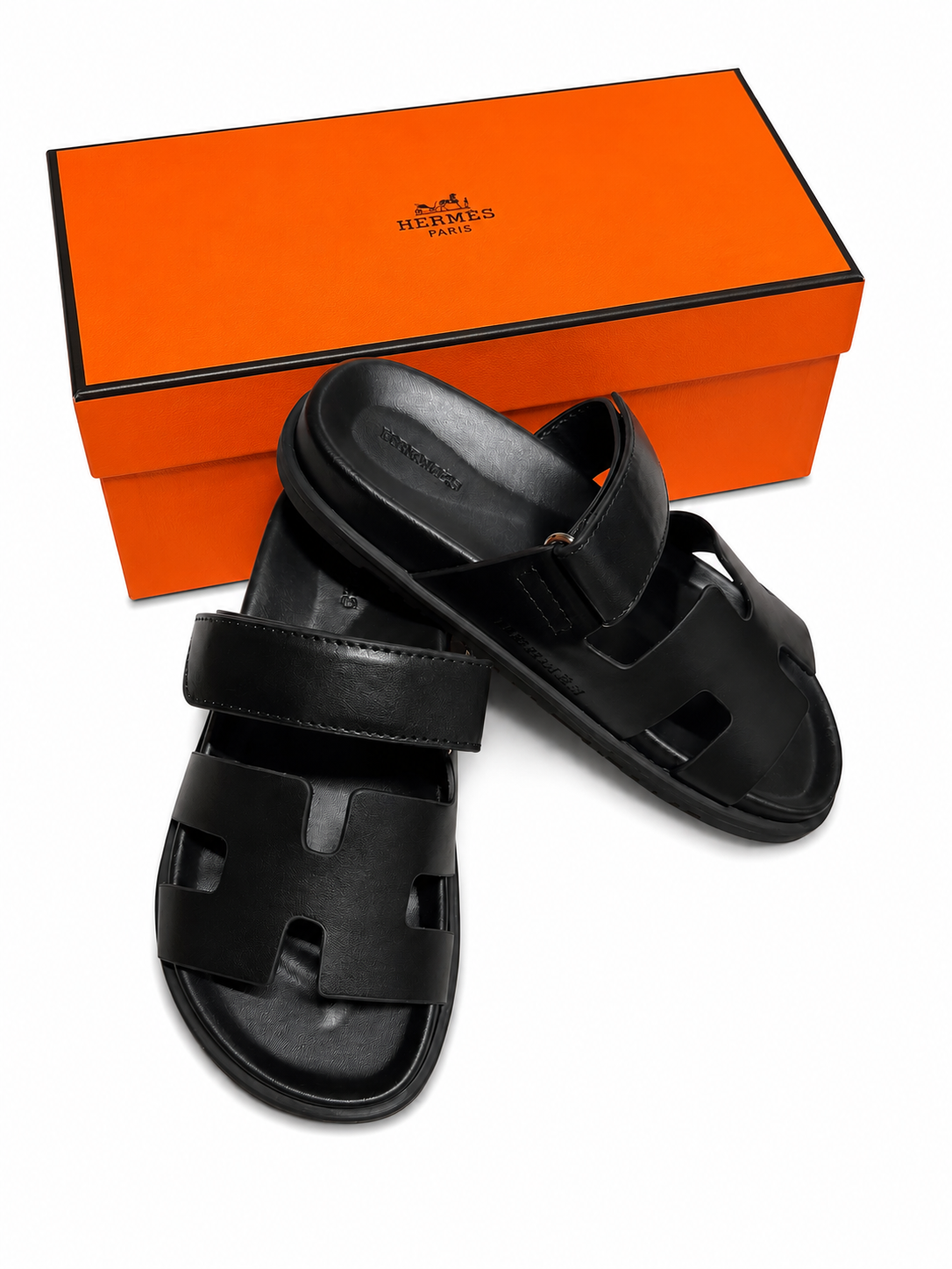 Klapki HERMÈS „Noir Prestige” – ekskluzywna jakość